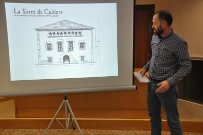 José Luis Campos presentant el seu reportatge de Manso Calders