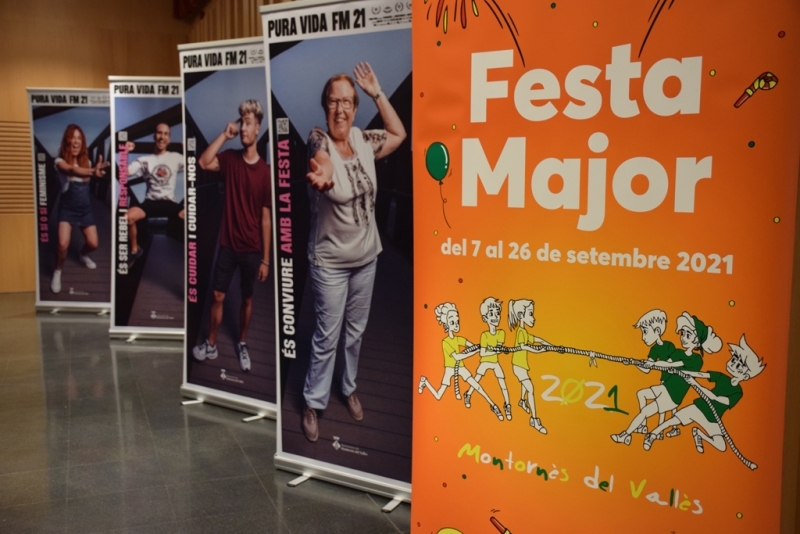 Plafons de la imatge de la Festa Major 2021 i de la campanya Pura Vida a l'acte de presentació d'aquest dimecres.