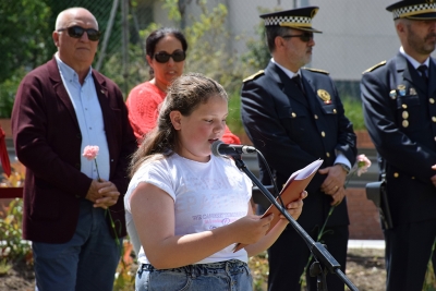 Lectura d'un poema a càrrec d'una integrant del Consell d'Infants.