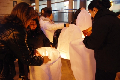Encesa dels fanals per part dels veïns